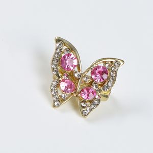 Brosa fluture auriu cu pietre roz