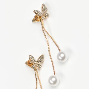 Cercei aurii lungi cu fluture si perle acrilice albe