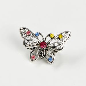 Brosa fluture argintiu cu pietre multicolore