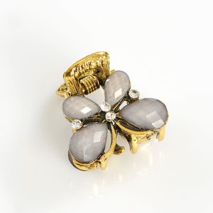 Cleste de par fluture cu pietre gri