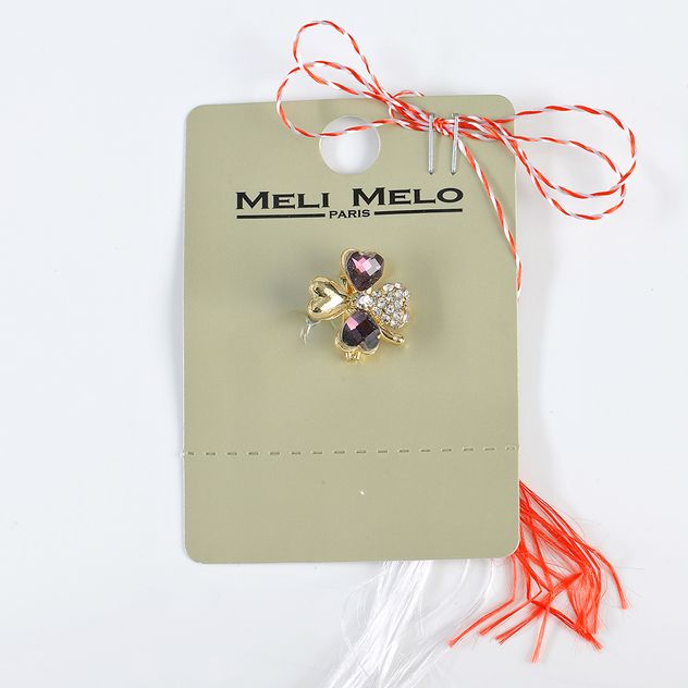 Floare aurie cu pietre mov