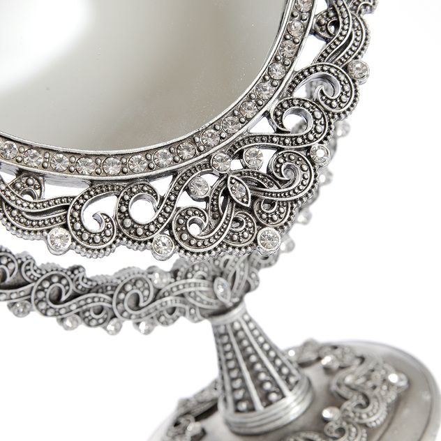 Oglinda de masa vintage argintie cu detalii ornamentale