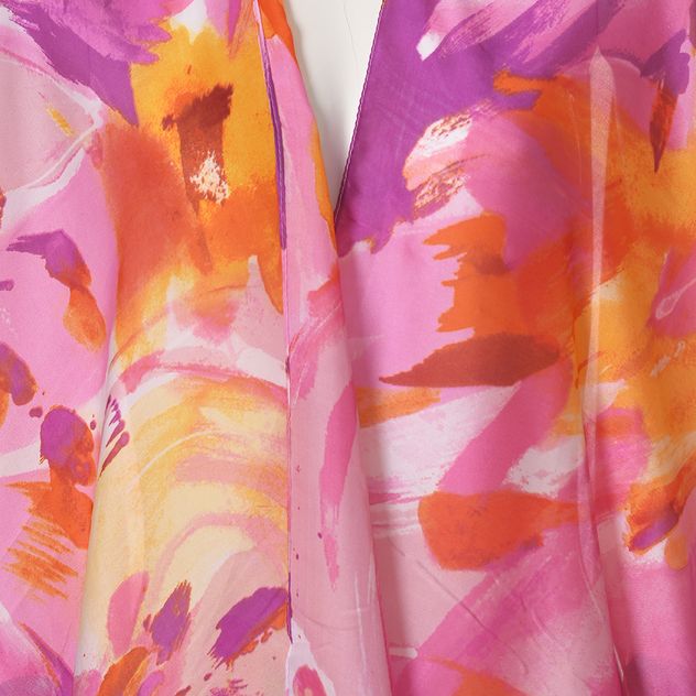 Poncho vaporos in nuante de roz