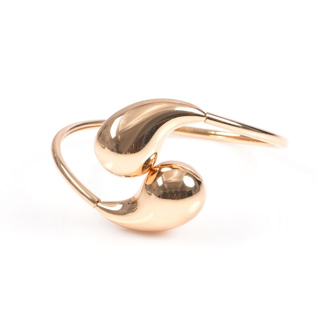 Bratara aurie cu design fluid modern
