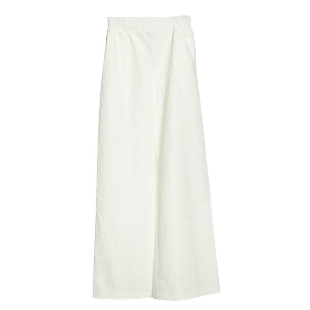 Pantaloni albi evazati cu talie elastica