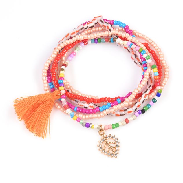 Bratara de picior multicolor cu ciucure si pandantiv inima