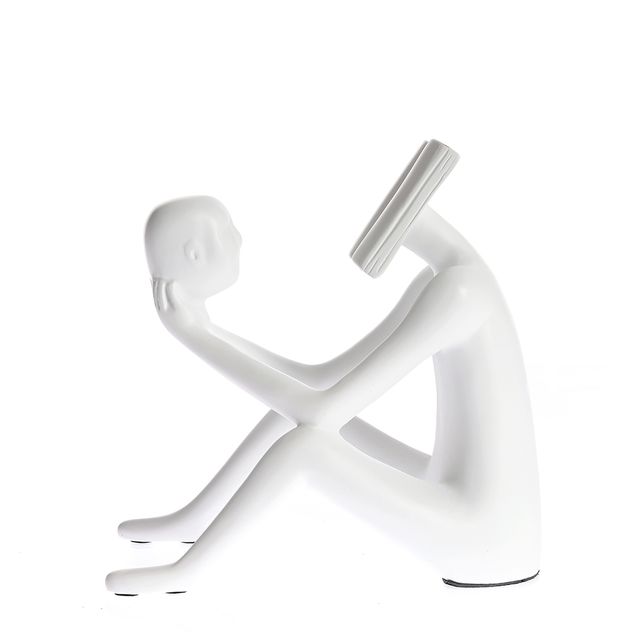 Statueta abstracta cu silueta cititorului si design minimalist