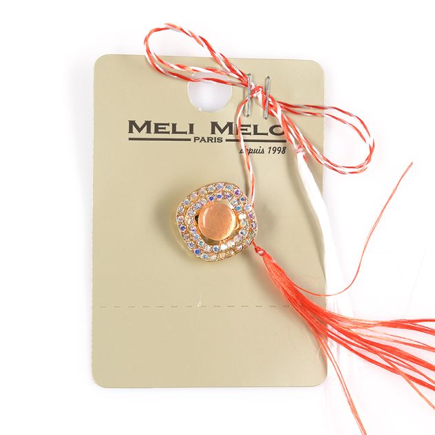 Brosa martisor elegant cu detalii aurii si margini cu pietre